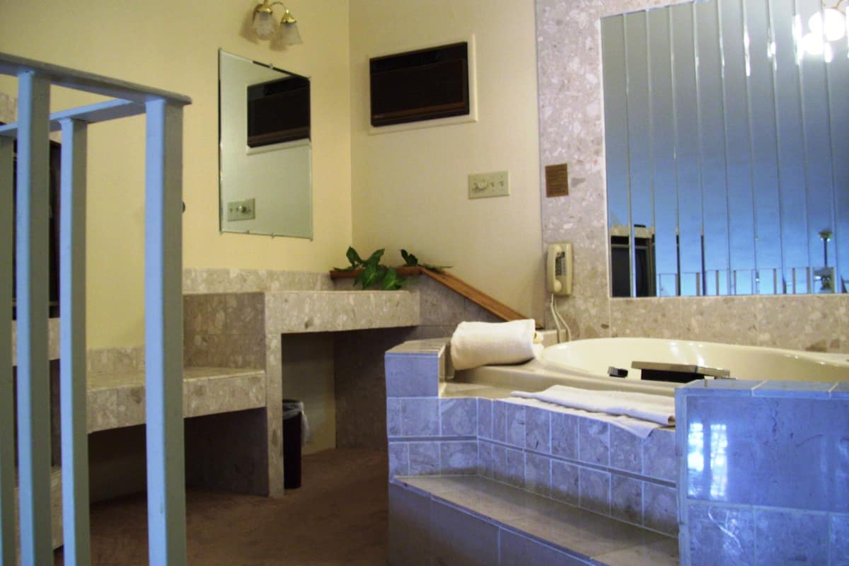 superior loft, 1 double bed, jetted tub, marina view | 1 bedroom, iron/ironing board, free wifi, bed sheets