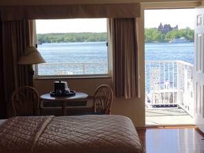 Panoramic Room, 2 Double Beds, Balcony, St. Lawrence River View | Iron/ironing board, free WiFi, bed sheets - Riveredge Resort (Alexandria Bay)