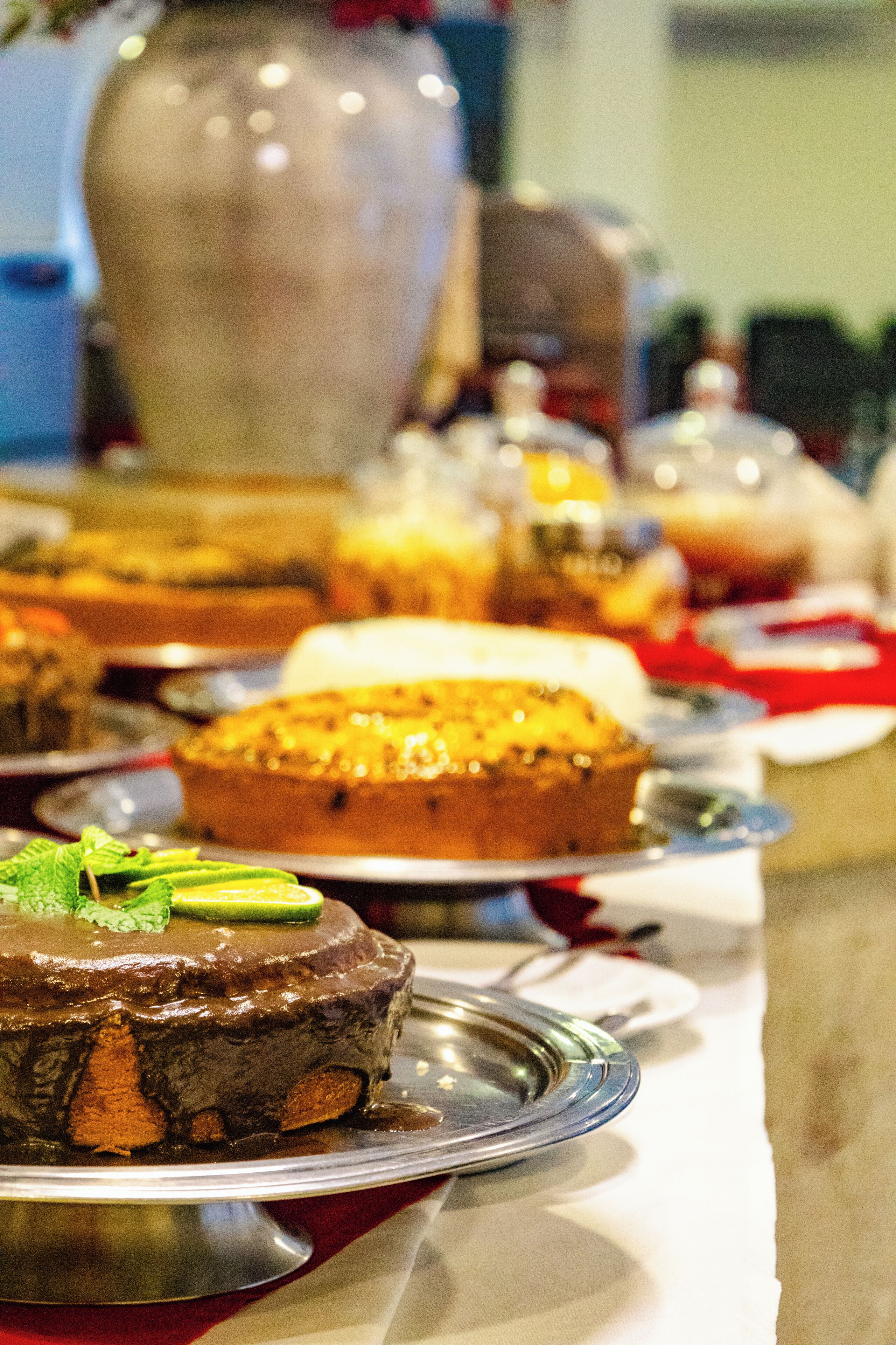 A variety of desserts on a buffet table.