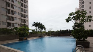 Outdoor pool - NIDA Rooms Depok Railway Station at Margonda Residence III (Depok)