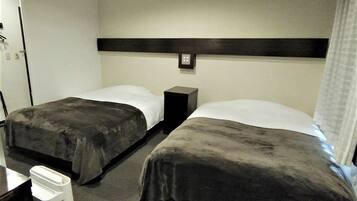 Down comforters, desk, WiFi (free), bed sheets