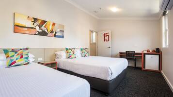 Economy Twin Queen with Shared Facilities | Desk, iron/ironing board, free WiFi, bed sheets