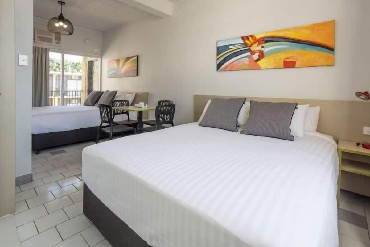 Minibar, desk, iron/ironing board, bed sheets