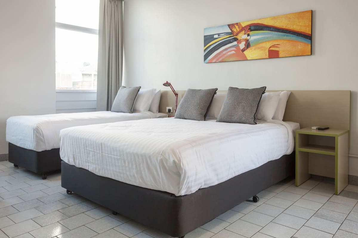 Two Bedroom Apartment | Minibar, desk, iron/ironing board, bed sheets
