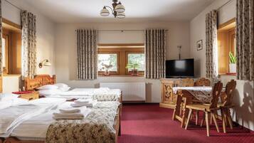 Standard Quadruple Room | Premium bedding, soundproofing, iron/ironing board, bed sheets