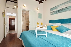 Premium bedding, in-room safe, laptop workspace, soundproofing