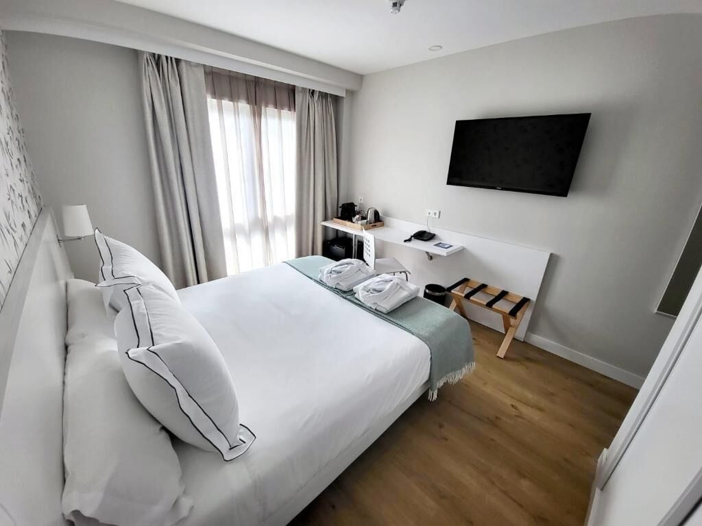 superior double room | desk, laptop workspace, blackout curtains, iron/ironing board