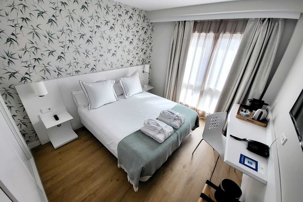 Superior Double Room | Desk, laptop workspace, blackout drapes, iron/ironing board (on request)