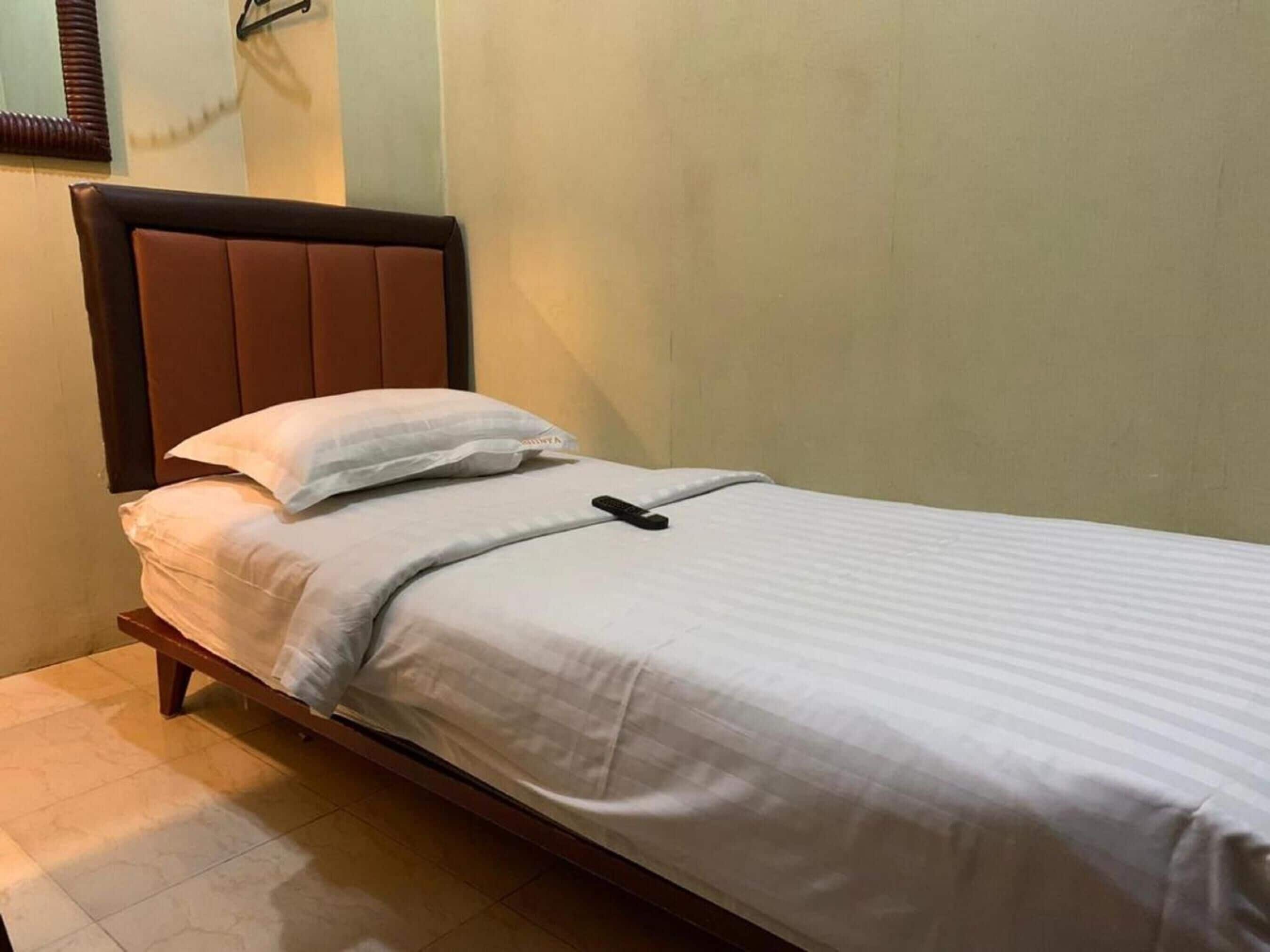 Biancheria da letto di alta qualità, una cassaforte in camera