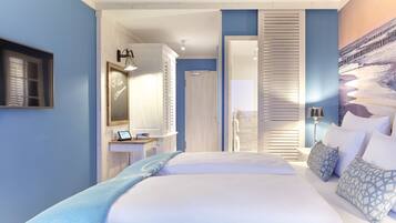 Hypoallergeen beddengoed, een bureau, babybedden, reisbedje