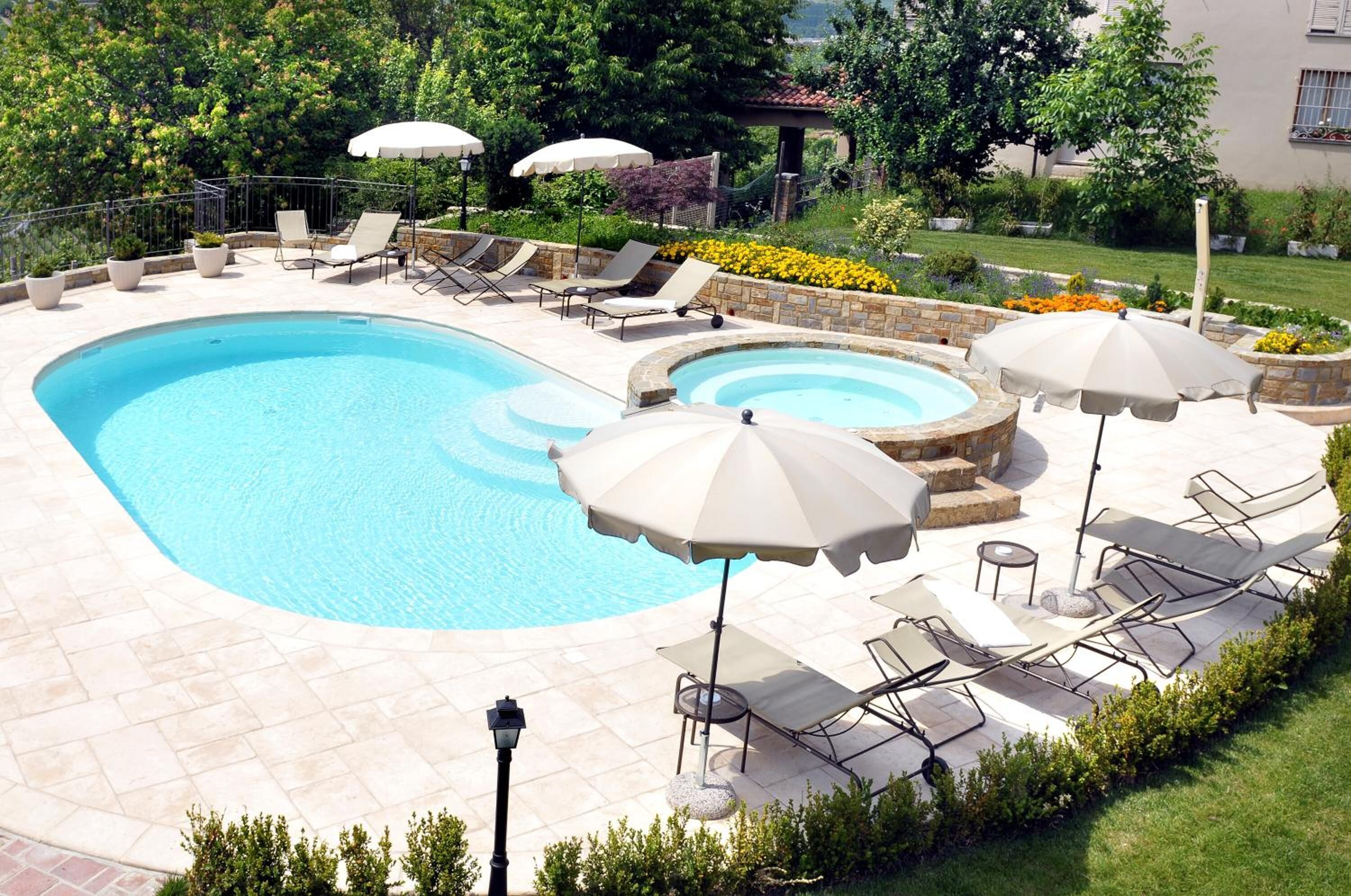 seasonal outdoor pool, pool umbrellas, pool loungers