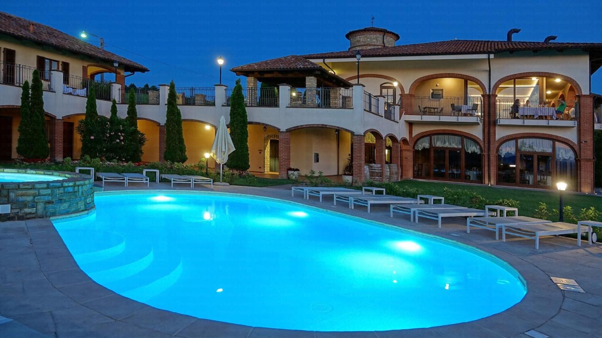 seasonal outdoor pool, pool umbrellas, pool loungers