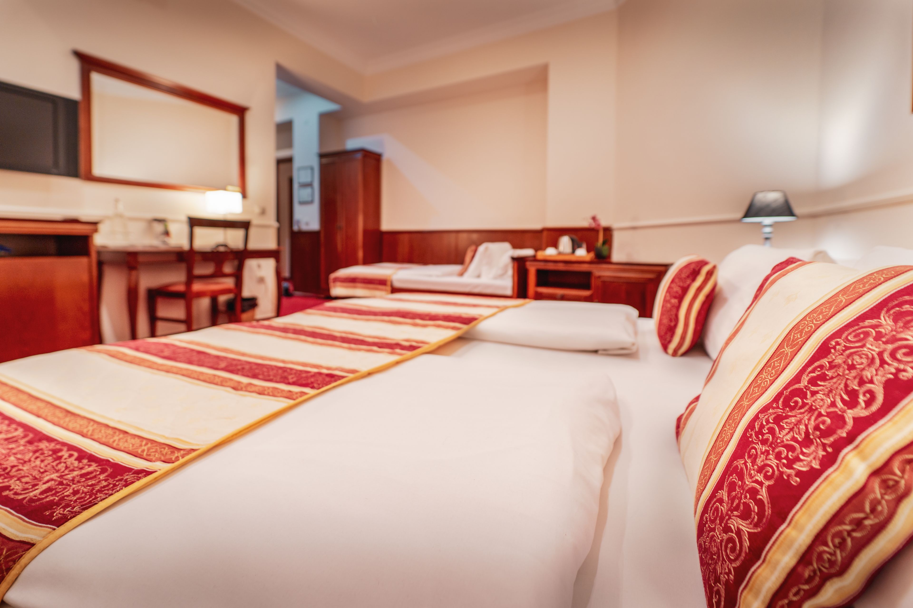 Driepersoonskamer | 1 slaapkamer, luxe beddengoed, een minibar, een kluis op de kamer