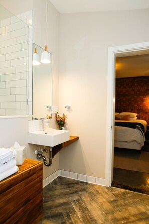 Suite, 1 King Bed with Sofa bed, Non Smoking | Bathroom | Shower, rainfall showerhead, designer toiletries, hair dryer - The Hotel Palms Courtyard (Atlantic Beach)