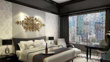 A modern hotel room with a large bed, a desk, and a view of a cityscape through a patterned window.
