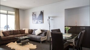 Deluxe Two Bedroom Apartment | Living room | Flat-screen TV, DVD player - Harbour Town Apartment (Docklands)