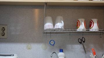 Comfort Duplex, 1 Bedroom, Mezzanine | Private kitchenette | Fridge, microwave, stovetop, coffee/tea maker