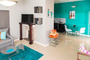 Superior Apartment, 2 Bedrooms, Terrace, Courtyard View | Living area | 50-inch flat-screen TV with cable channels, TV, DVD player