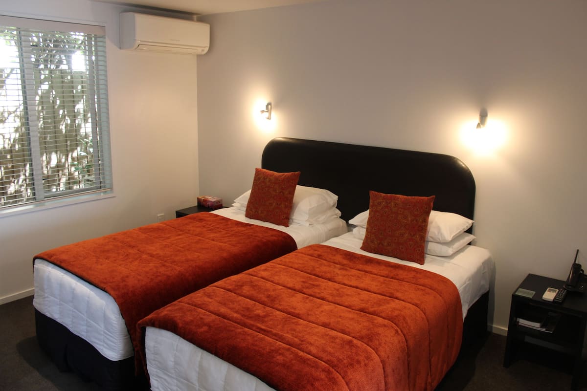 Executive studio | Een strijkplank/strijkijzer, gratis babybedden, gratis wifi, beddengoed