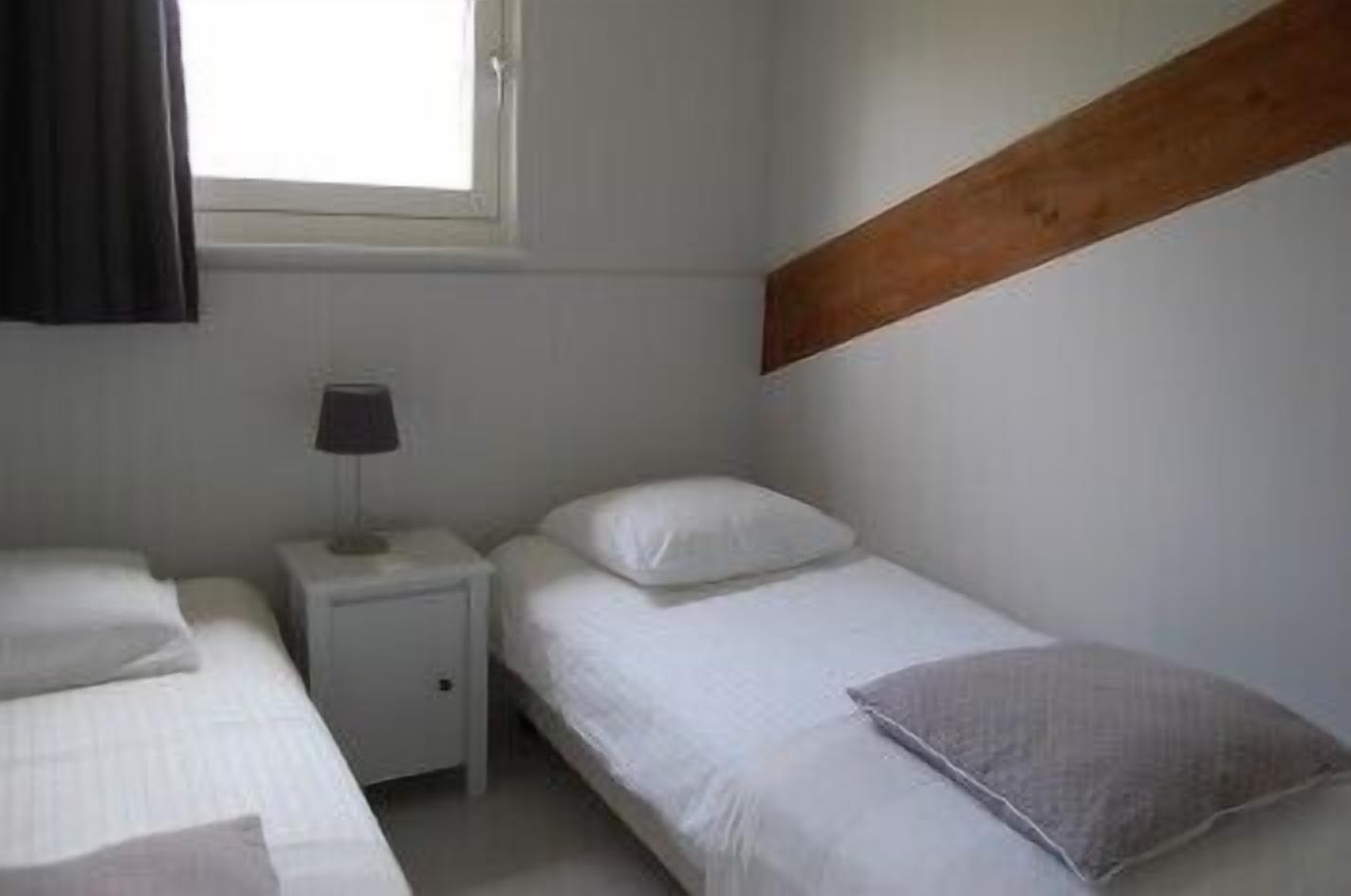 apartment, 2 bedrooms (de schelp) | minibar, individually decorated, desk, free cots/infant beds