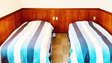 Standard Twin Room with Sofa | Down comforters, individually decorated, desk, blackout drapes