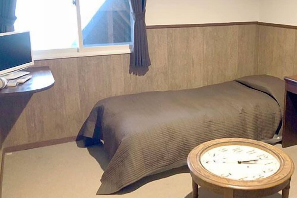 Down comforters, desk, blackout drapes, soundproofing
