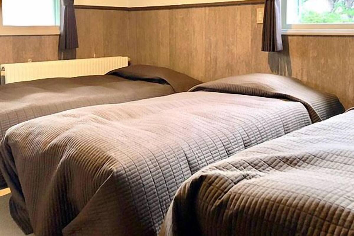Down comforters, desk, blackout drapes, soundproofing
