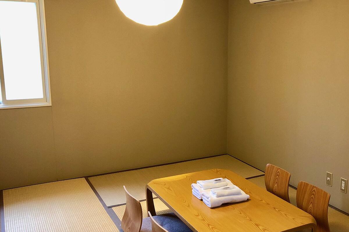 Japanese Western Style Family Room | Down comforters, desk, blackout drapes, soundproofing