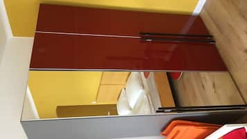 Studio, 1 Bedroom, Kitchen | Living area | Flat-screen TV