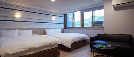 Family Quadruple Room | Down comforters, individually decorated, desk, laptop workspace