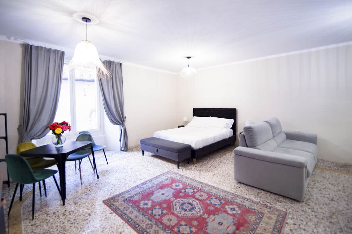 Apartment, Kitchenette | Individually decorated, desk, blackout drapes, soundproofing
