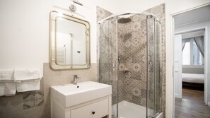 Quadruple Room, 2 Bedrooms, Private Bathroom (Adjoining rooms) | Bathroom | Shower, rainfall showerhead, free toiletries, hair dryer - La Piazzetta Rooms (Genoa)