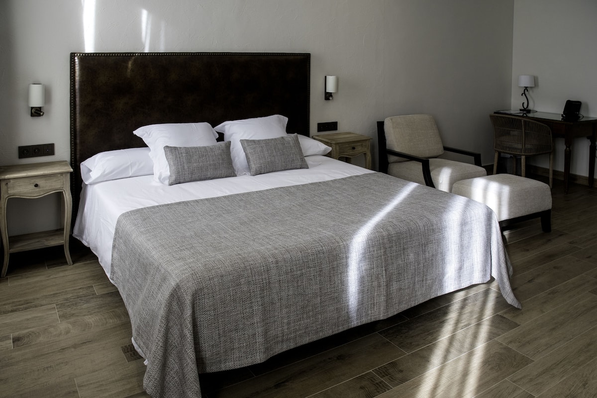 Junior Suite | 1 bedroom, premium bedding, in-room safe, individually decorated