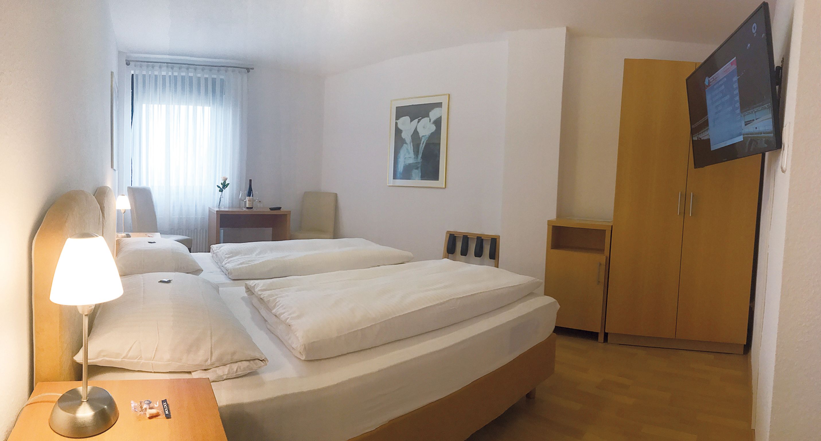 standard double room | minibar, desk, blackout curtains, soundproofing