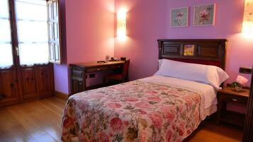 Desk, blackout curtains, iron/ironing board, cots/infant beds