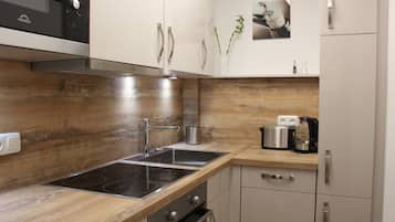 Comfort-studiolejlighed - 1 kingsize-seng med sovesofa - bjergudsigt - ved bjerg | Privat køkken | Køleskab/fryser i fuld størrelse, kogeplade, opvaskemaskine