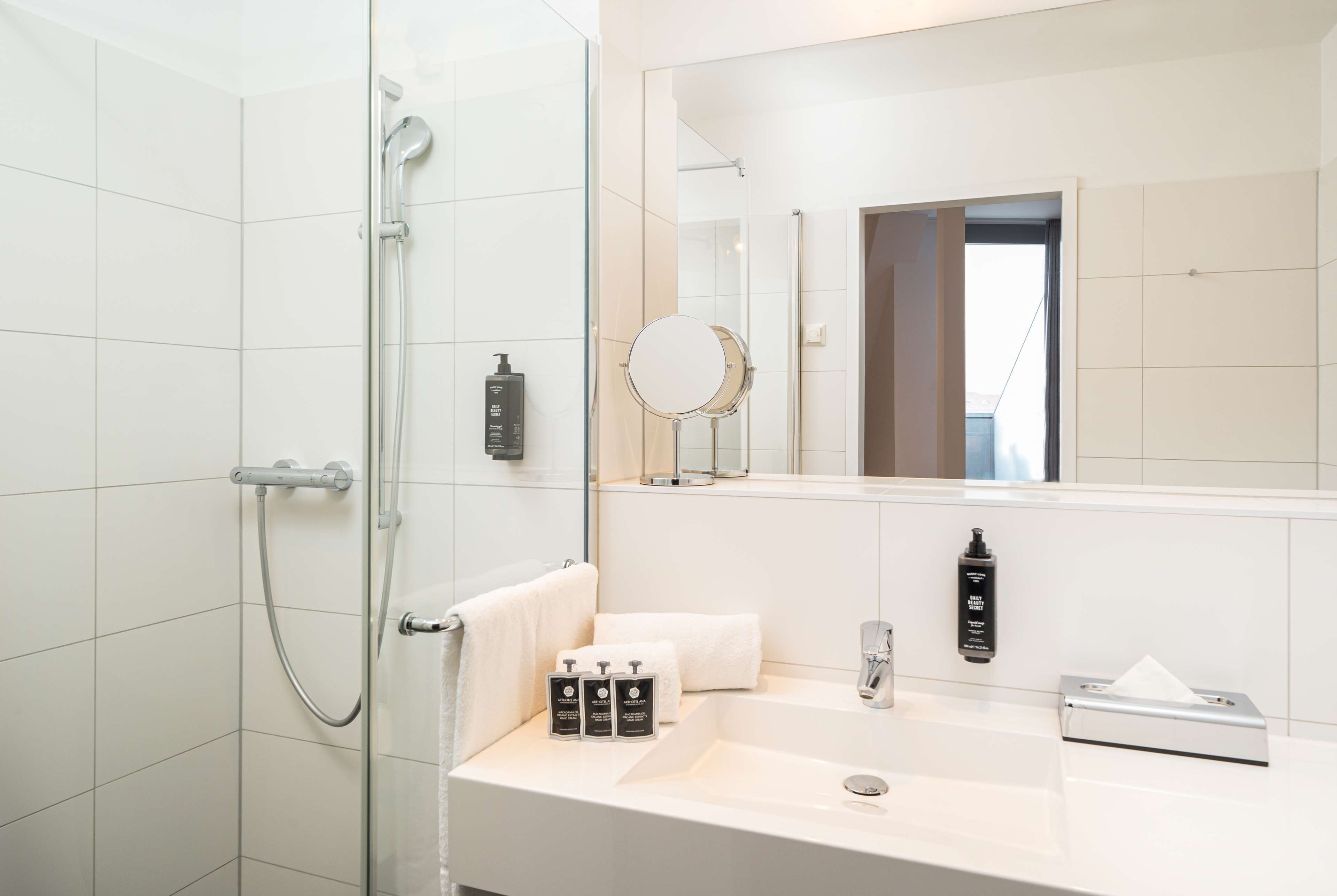 superior triple room | bathroom | shower, eco-friendly toiletries, towels