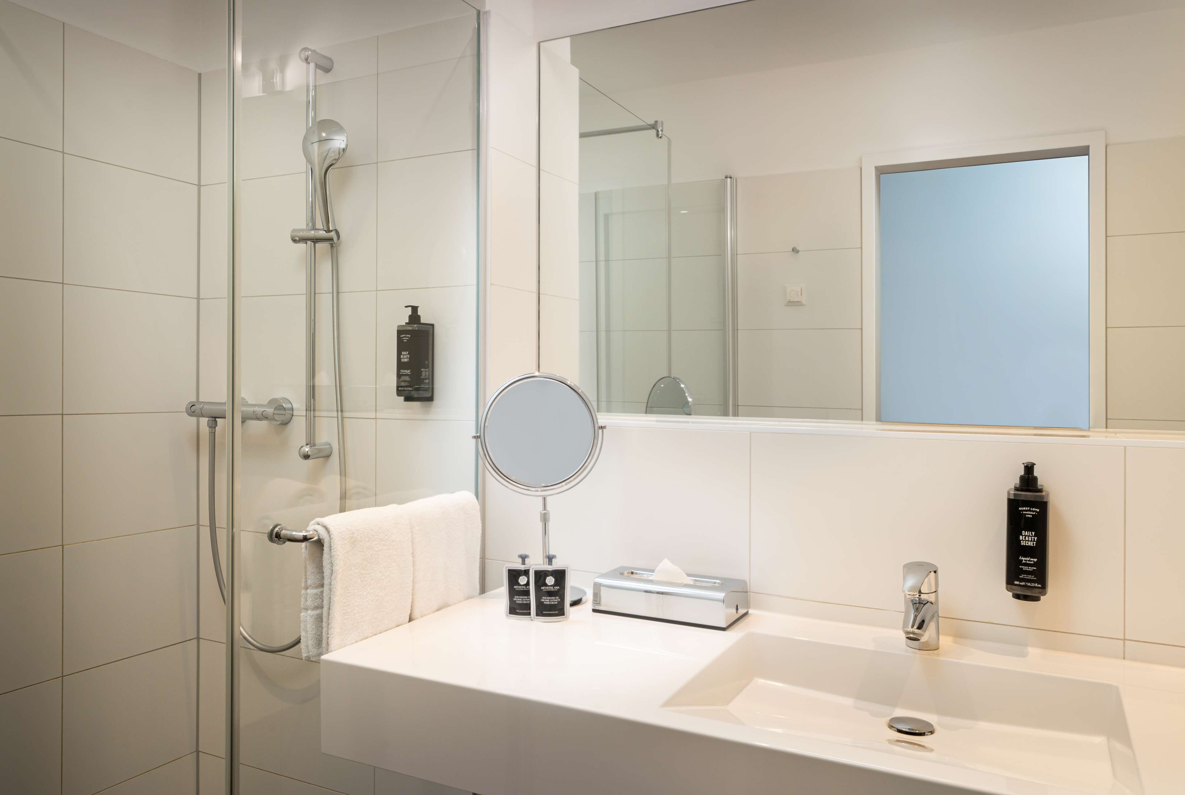 shower, eco-friendly toiletries, towels