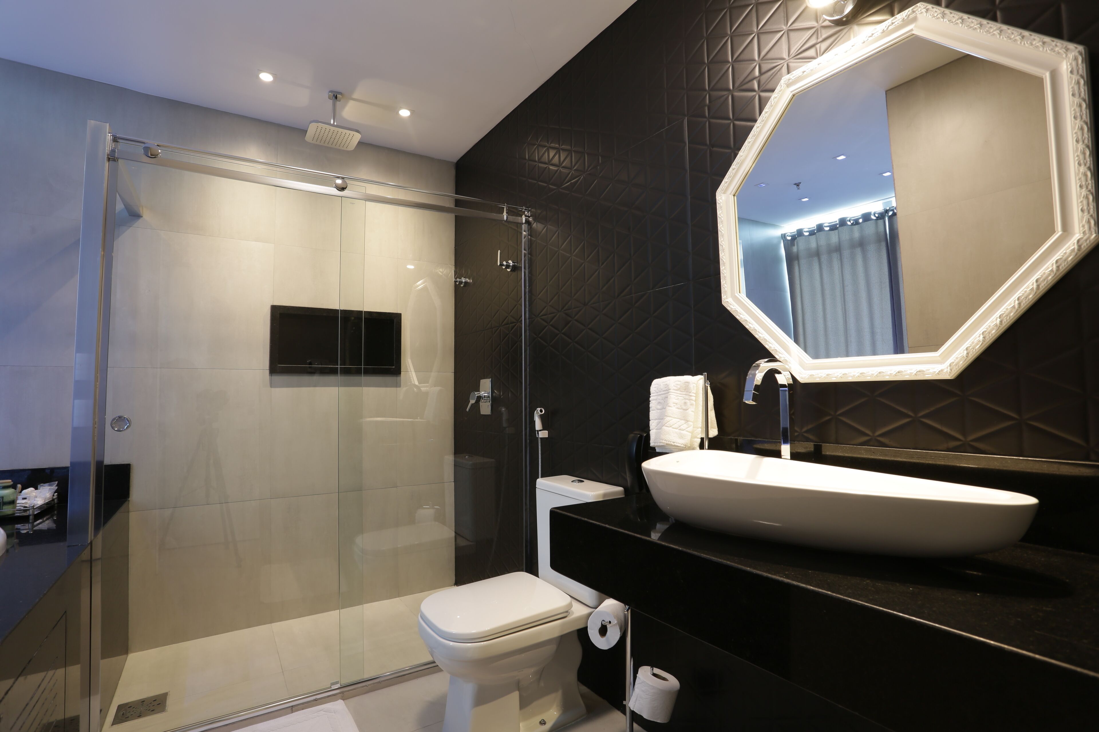 premium studio suite | bathroom | free toiletries, hair dryer, towels