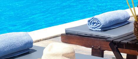 Outdoor pool, pool umbrellas, pool loungers