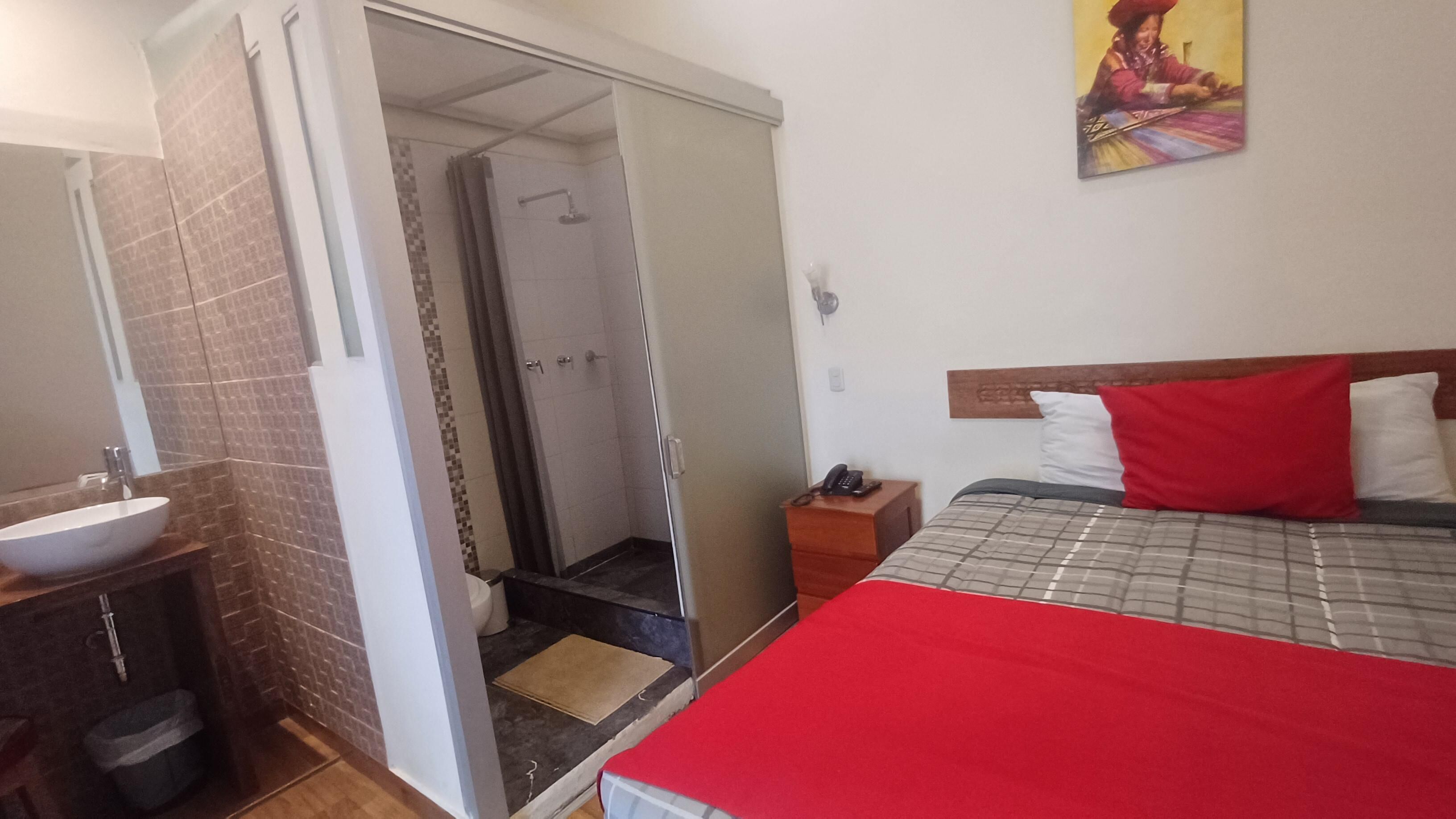 Down comforters, desk, WiFi (free), bed sheets