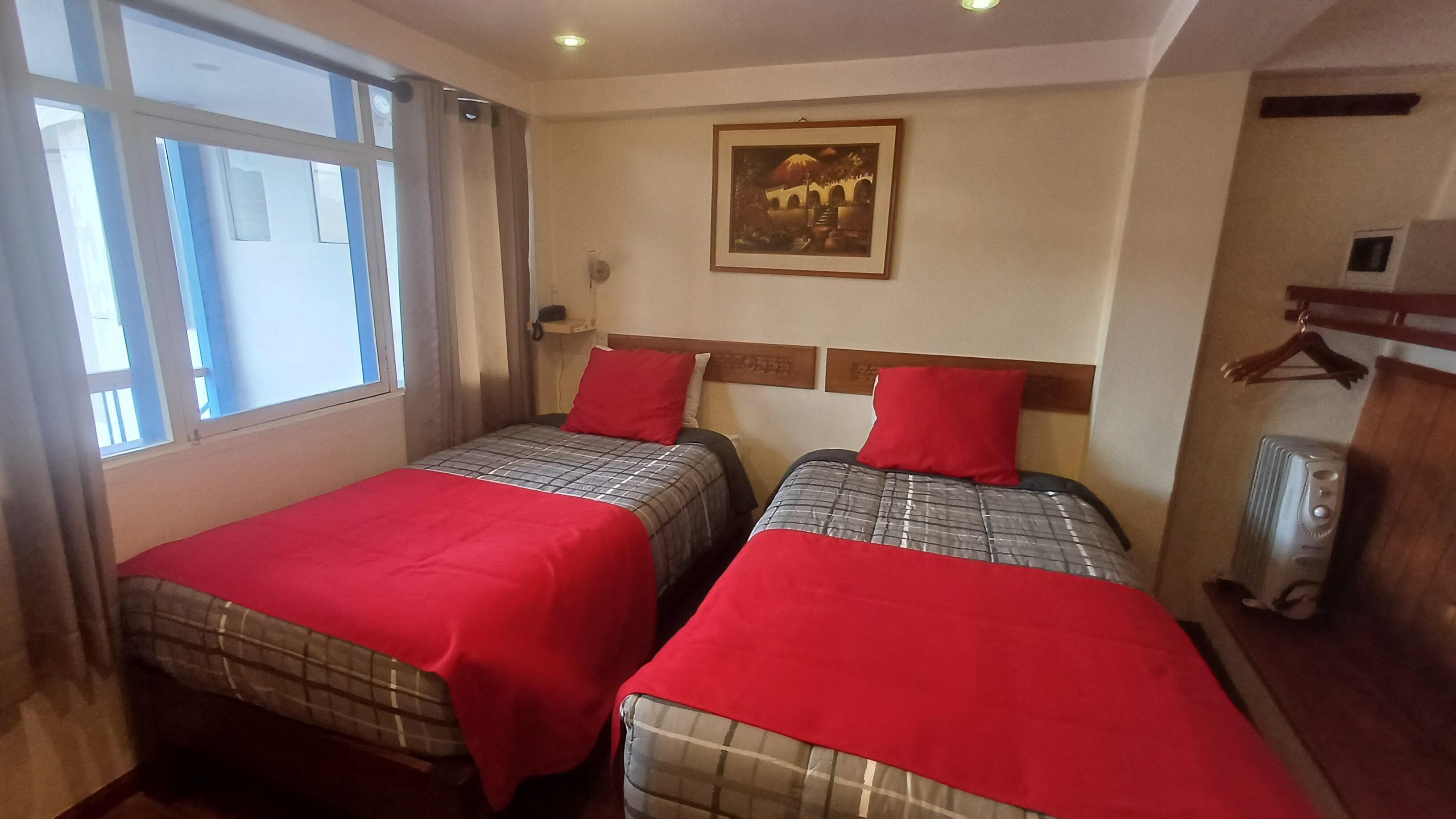 Down comforters, desk, WiFi (free), bed sheets