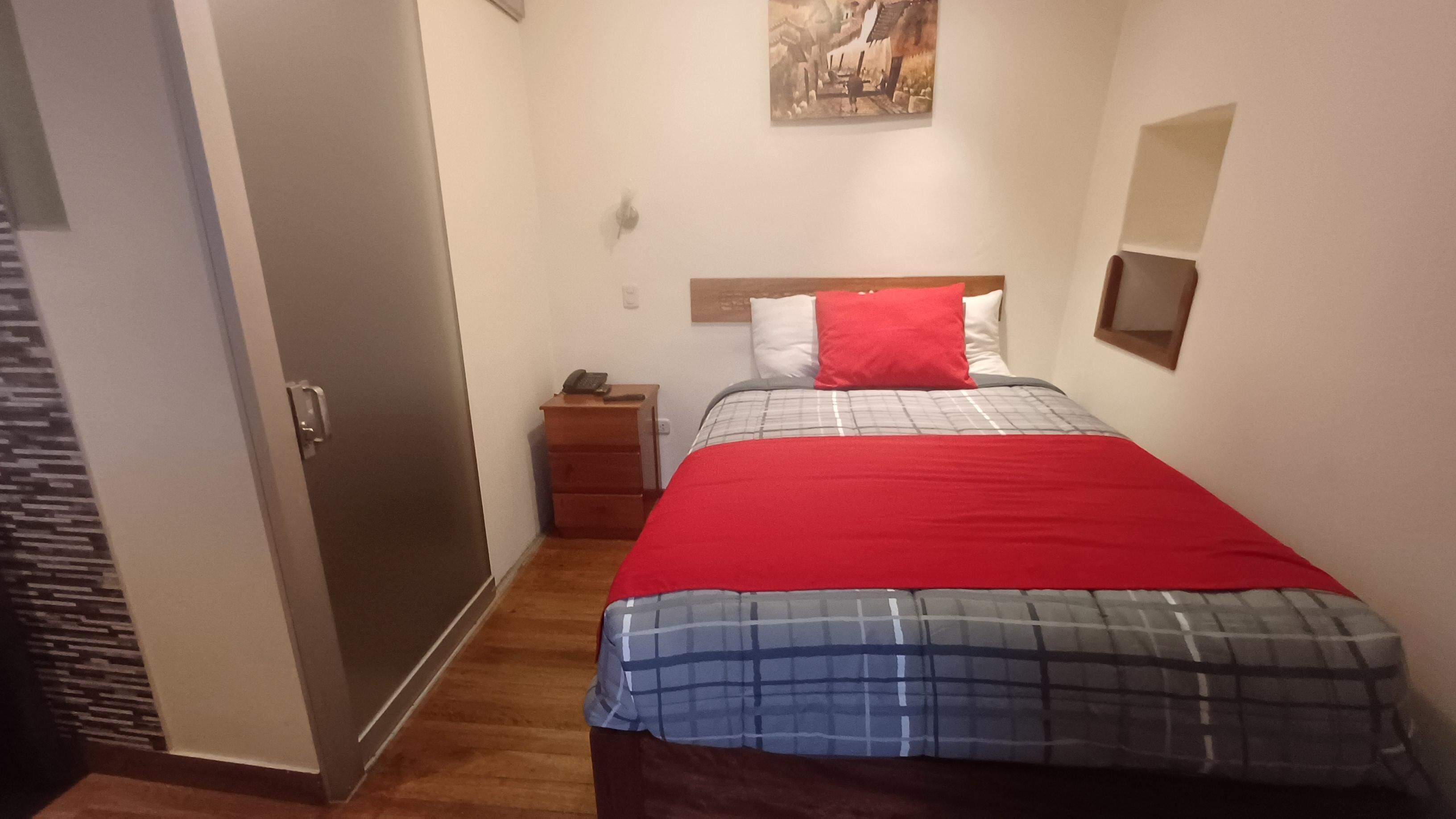 Down comforters, desk, WiFi (free), bed sheets