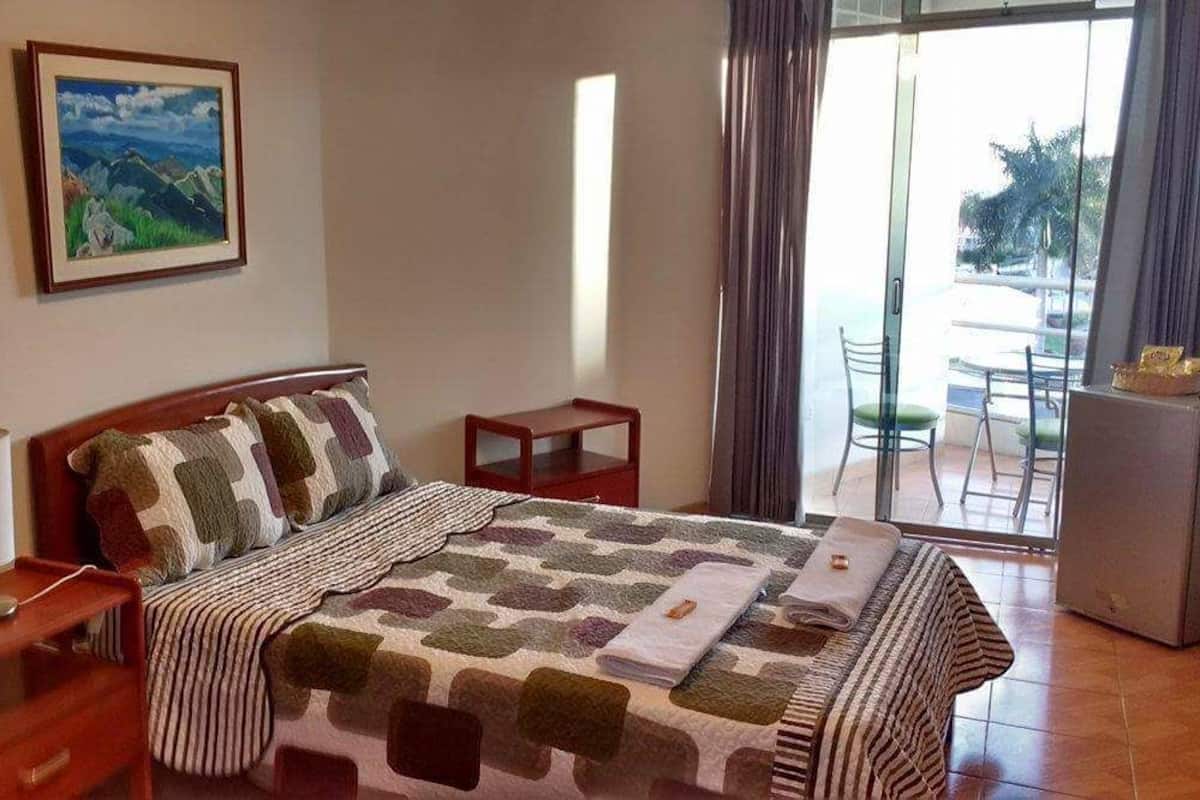 Romantic Double Room, Refrigerator, City View | Minibar, in-room safe, desk, rollaway beds