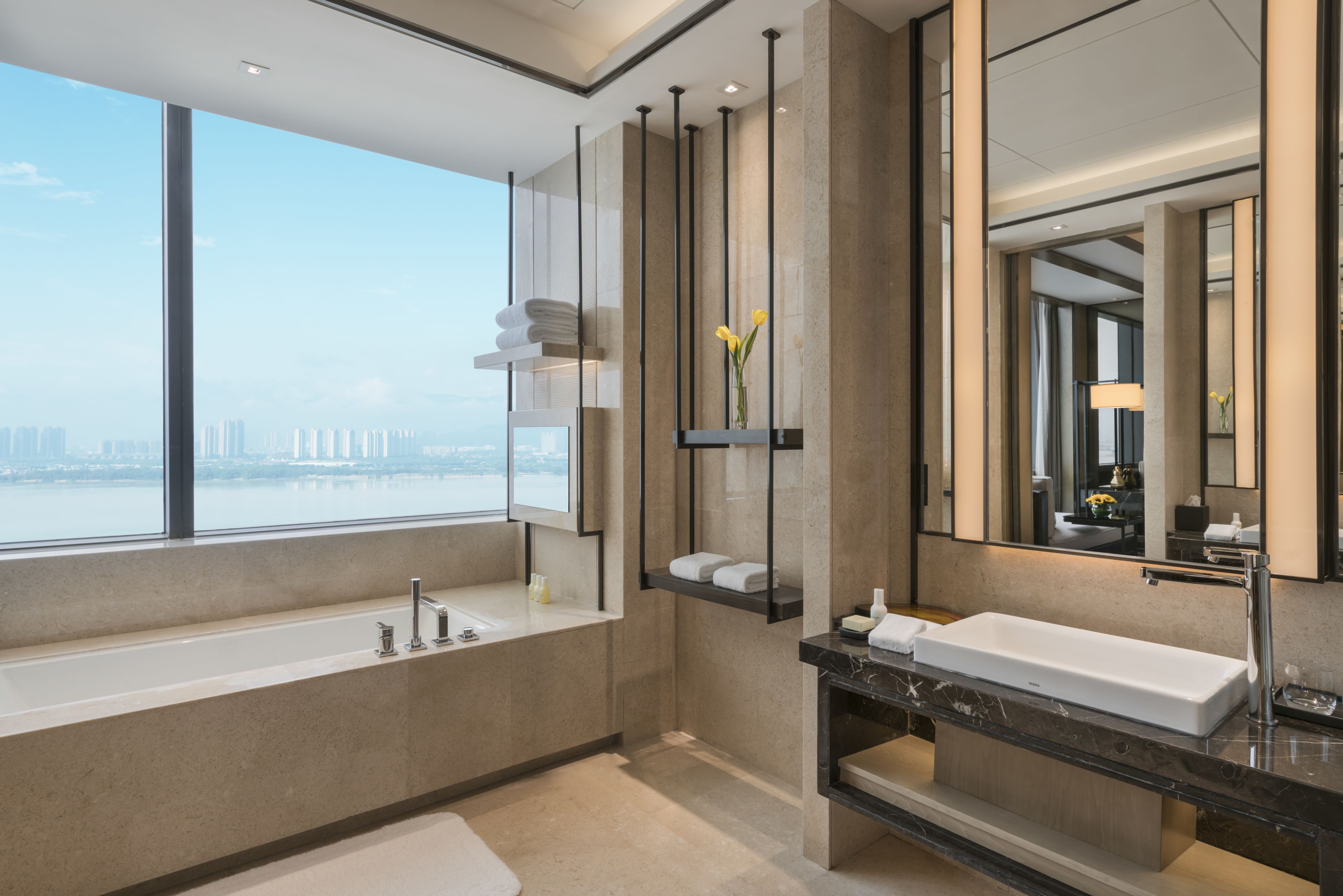 1 king bed suite | bathroom | separate bathtub and shower, rainfall showerhead, designer toiletries