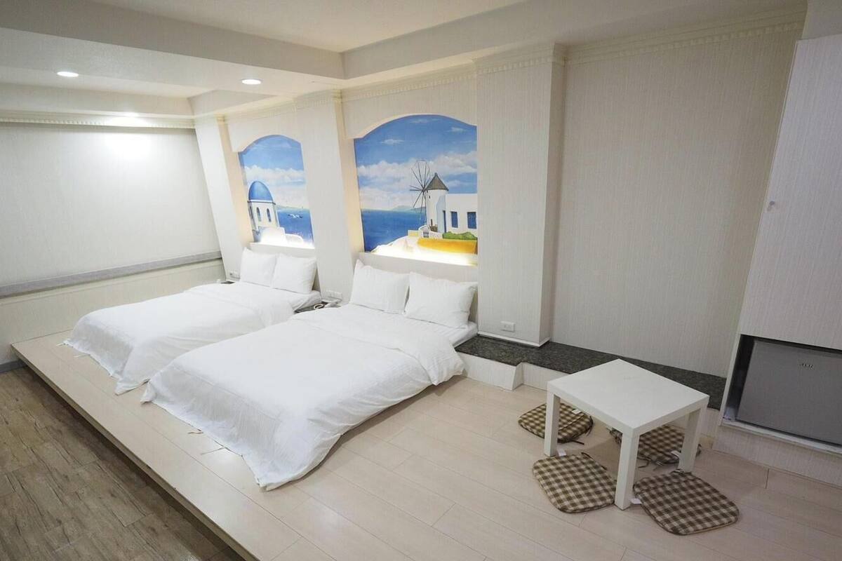Deluxe Quadruple Room | Blackout drapes, WiFi (free), bed sheets