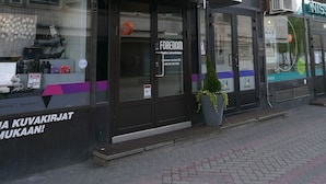 An exterior of a hotel named 'APARTHOTEL FORENOM' with a modern facade, large windows, and a visible entrance. - Forenom Aparthotel Raahe (Raahe)