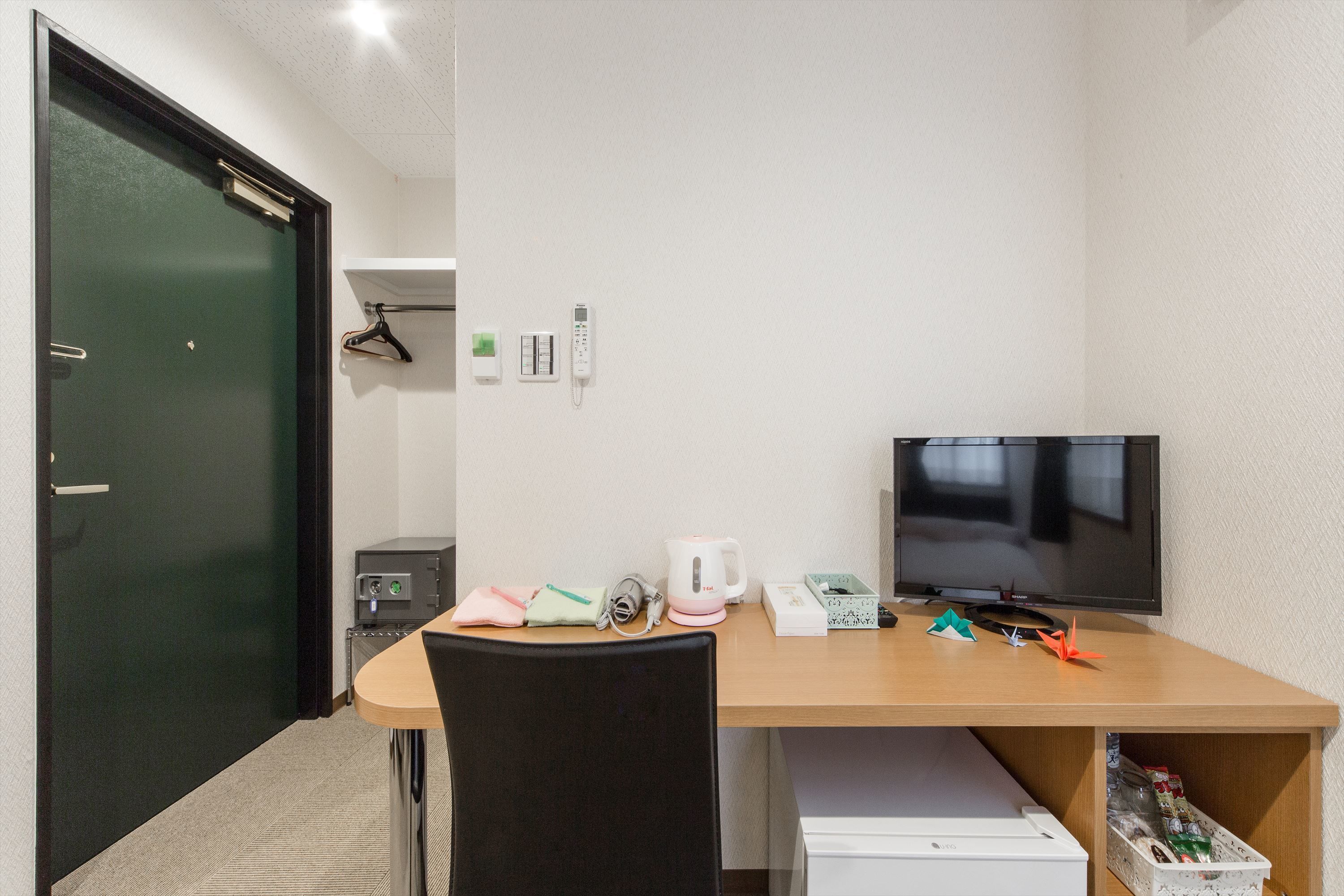 hypo-allergenic bedding, down duvets, in-room safe, desk