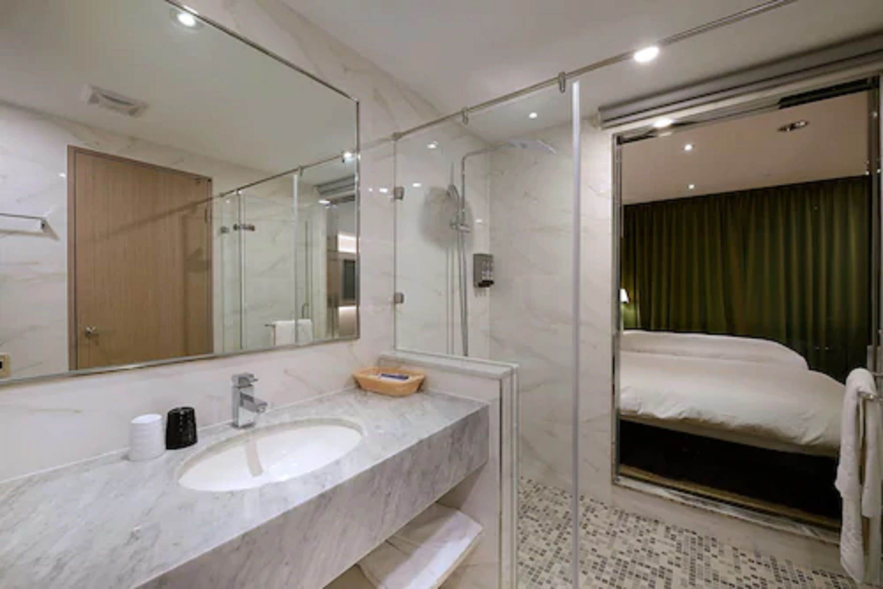 shower, rainfall showerhead, hair dryer, slippers