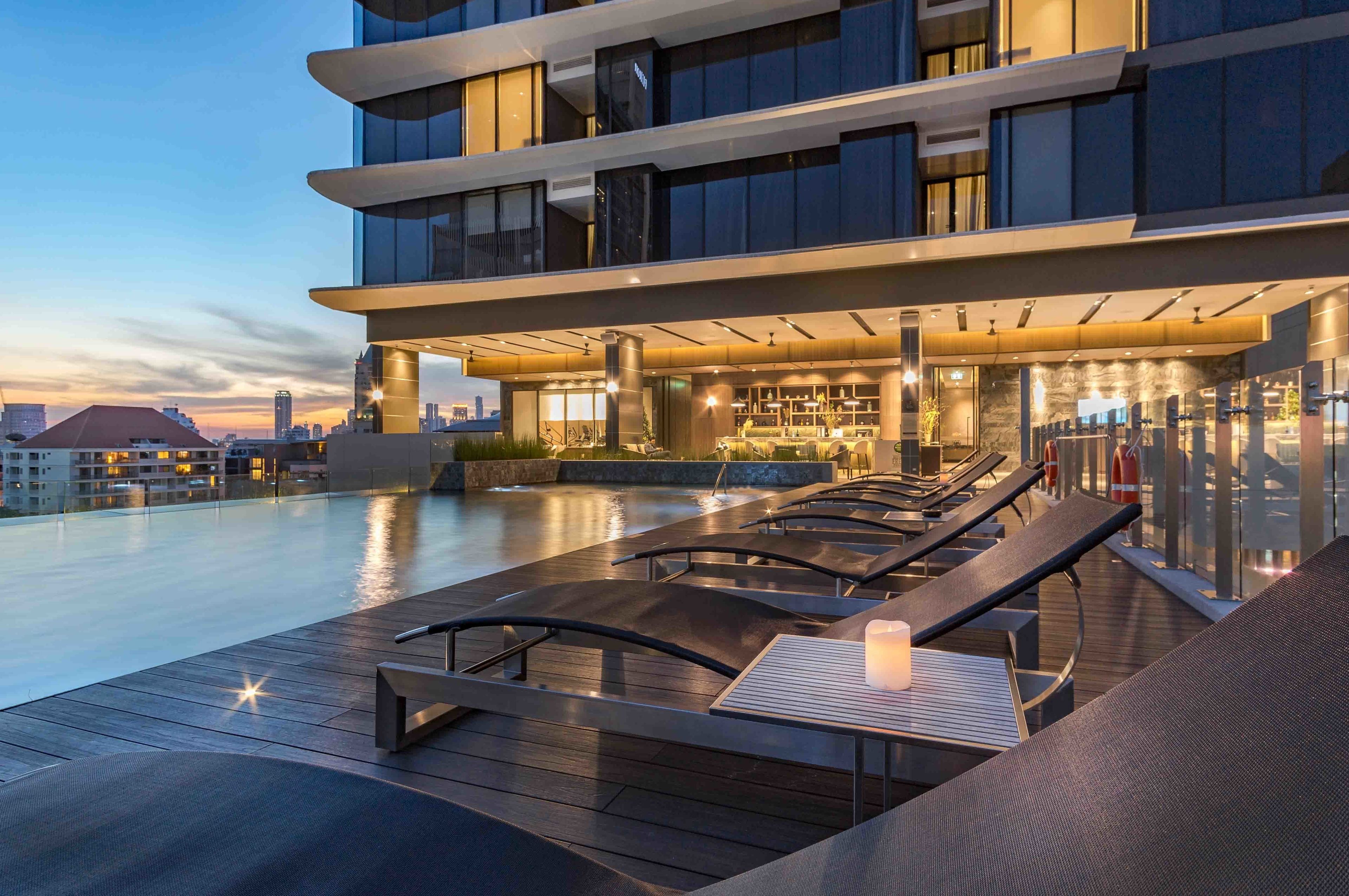 Outdoor pool, pool umbrellas, pool loungers